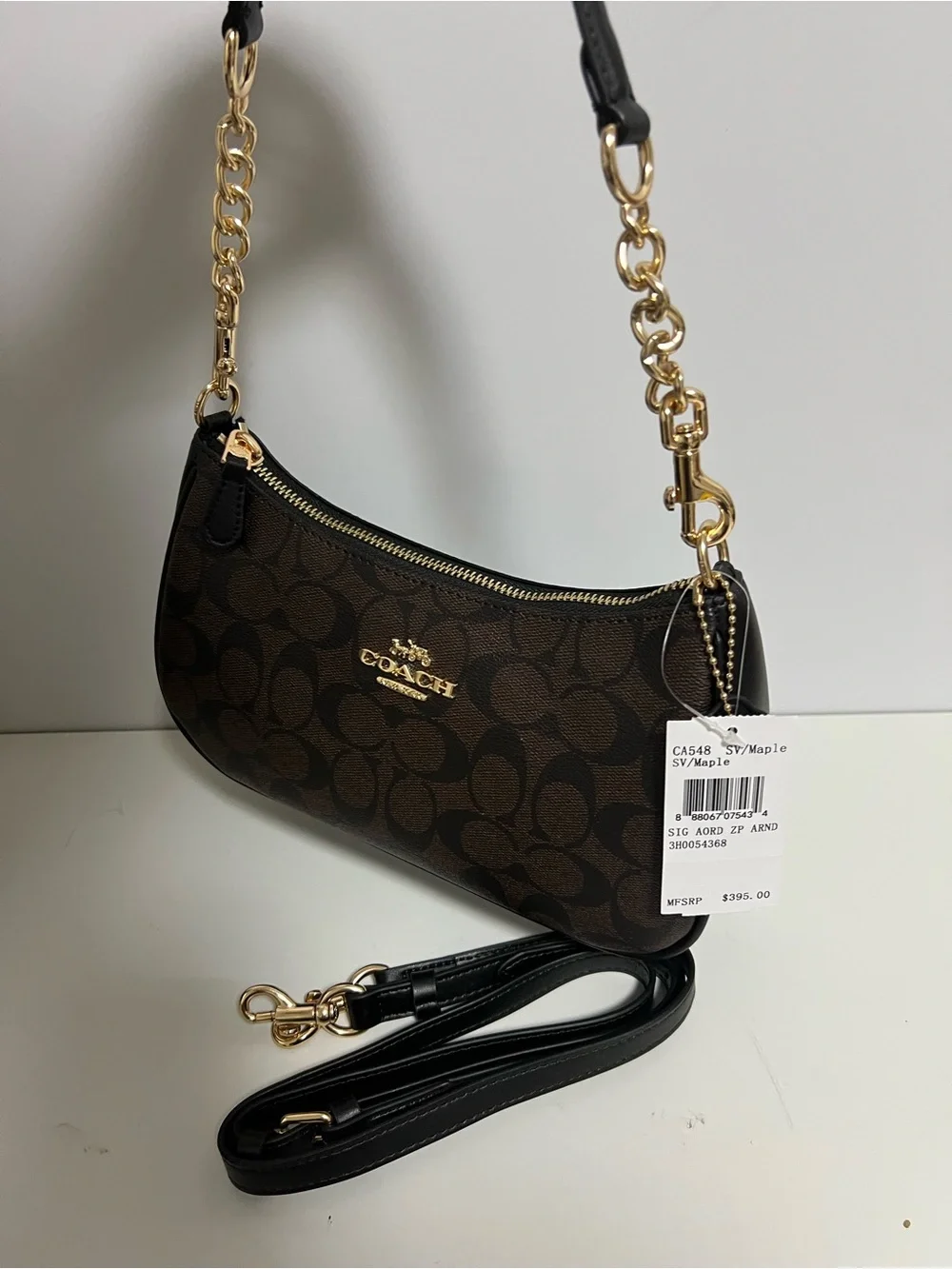 Coach Brown Signature Canvas Shoulder Bag with Black Trim and Gold Hardware